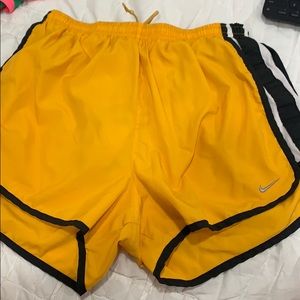 Yellow Nike Dri Fit shorts
